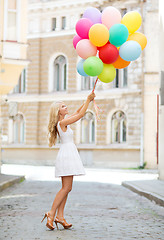 Image showing woman with colorful balloons