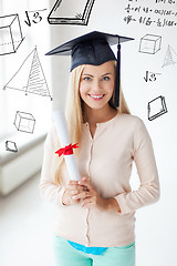 Image showing student in graduation cap with certificate