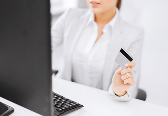 Image showing businesswoman with laptop and credit card