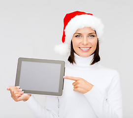 Image showing woman in santa helper hat with tablet pc