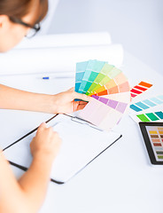 Image showing woman working with color samples for selection