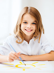 Image showing little girl painting at school