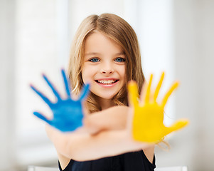 Image showing girl showing painted hands