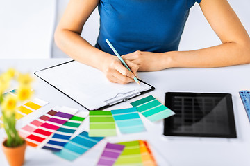 Image showing woman working with color samples for selection