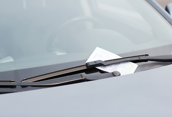 Image showing parking ticket on car windscreen