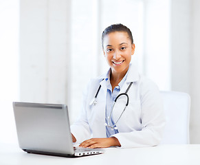 Image showing female doctor with laptop pc