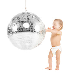 Image showing toddler playing with disco ball