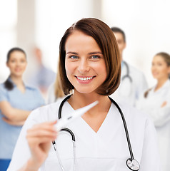 Image showing doctor with thermometer and stethoscope