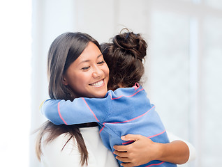 Image showing hugging mother and daughter