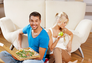 Image showing couple eating different food