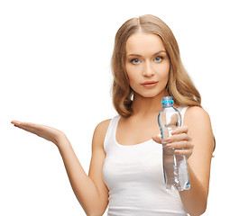 Image showing young beautiful woman with bottle of water