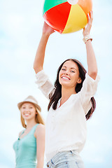 Image showing girls playing ball on the beach