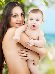 Image showing happy mother with adorable baby