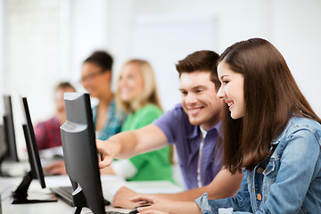 Image showing students with computers studying at school