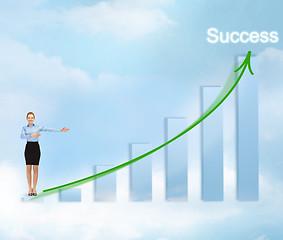 Image showing businesswoman with big 3d chart