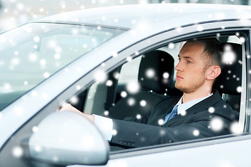 Image showing businessman driving a car