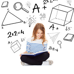 Image showing student girl studying and reading book