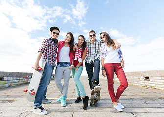 Image showing teenagers with skates outside