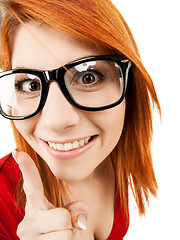 Image showing woman in glasses with finger up