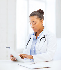 Image showing african female doctor with tablet pc
