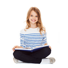 Image showing student girl studying and reading book