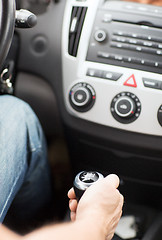 Image showing man shifting the gear on car manual gearbox