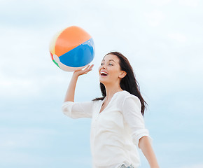 Image showing girl with ball on the beach