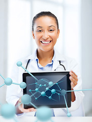 Image showing african female doctor with tablet pc and molecules
