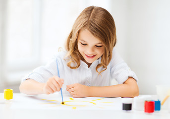 Image showing little girl painting at school