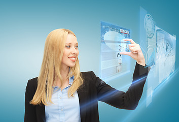 Image showing woman with virtual screen and news