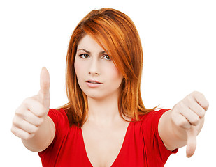 Image showing businesswoman with thumbs up and down