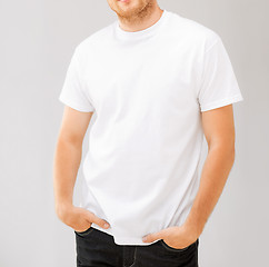 Image showing smiling man in blank white t-shirt