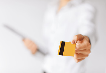 Image showing woman showing gold credit card