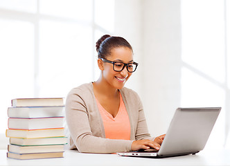 Image showing international student girl with laptop at school