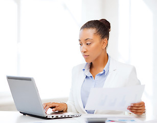 Image showing businesswoman working with computer in office