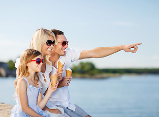 Image showing happy family eating ice cream