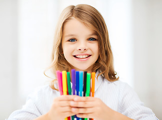 Image showing girl showing colorful felt-tip pens