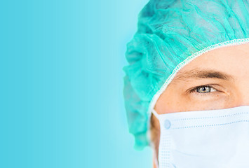 Image showing surgeon in medical cap and mask