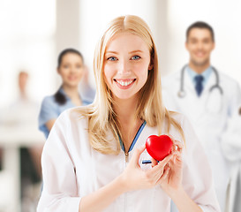 Image showing female doctor with heart