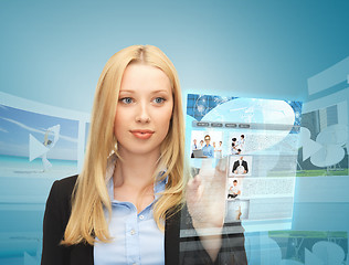 Image showing woman with virtual screen and news