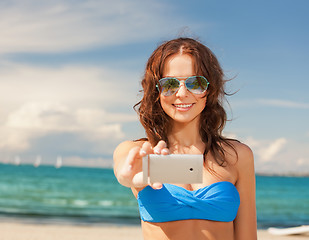 Image showing woman in bikini and sunglasses