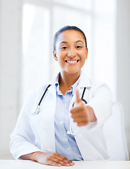 Image showing doctor with stethoscope showing thumbs up