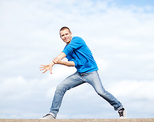 Image showing handsome boy making dance move