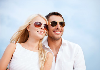 Image showing couple in shades at sea side