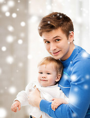 Image showing happy father with adorable baby