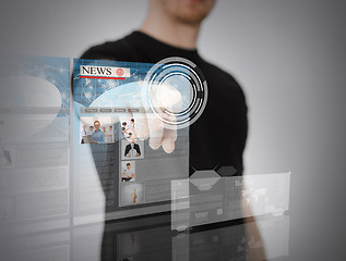 Image showing man pressing button on virtual screen