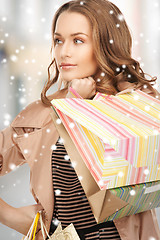 Image showing woman with shopping bags in ctiy