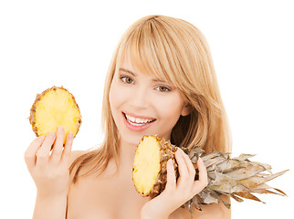 Image showing happy girl with pineapple