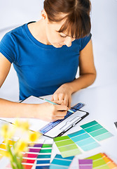 Image showing woman working with color samples for selection