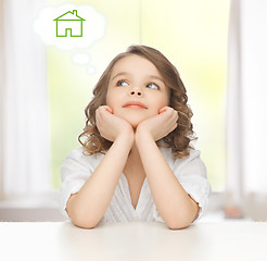 Image showing girl dreaming about the house